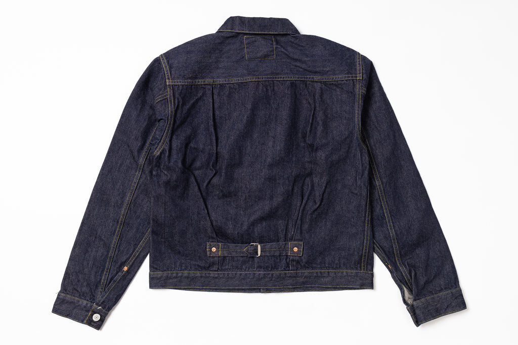 Dark blue denim jacket on a white background