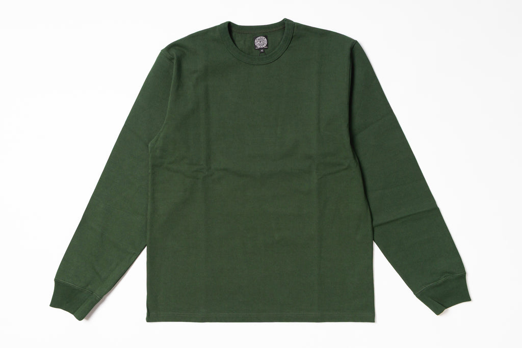 Green long-sleeve shirt on a white background