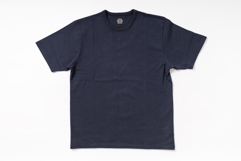 A dark navy blue short-sleeve crewneck t-shirt laid flat against a clean white background.