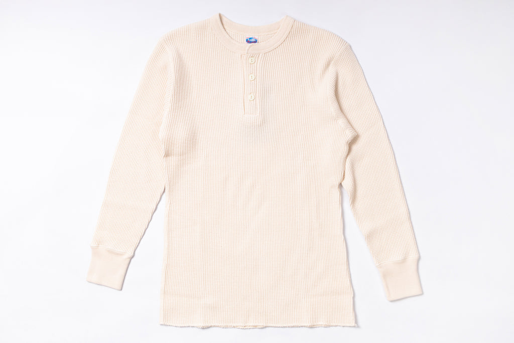 Beige long-sleeve shirt on a white background