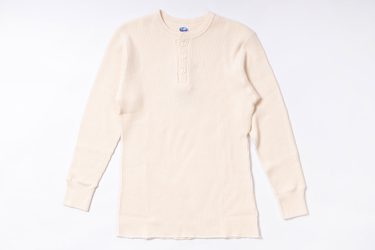 Beige long-sleeve shirt on a white background