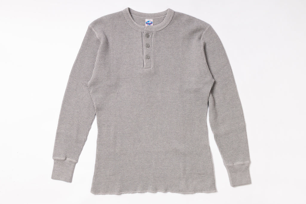 Gray long-sleeve shirt on a white background
