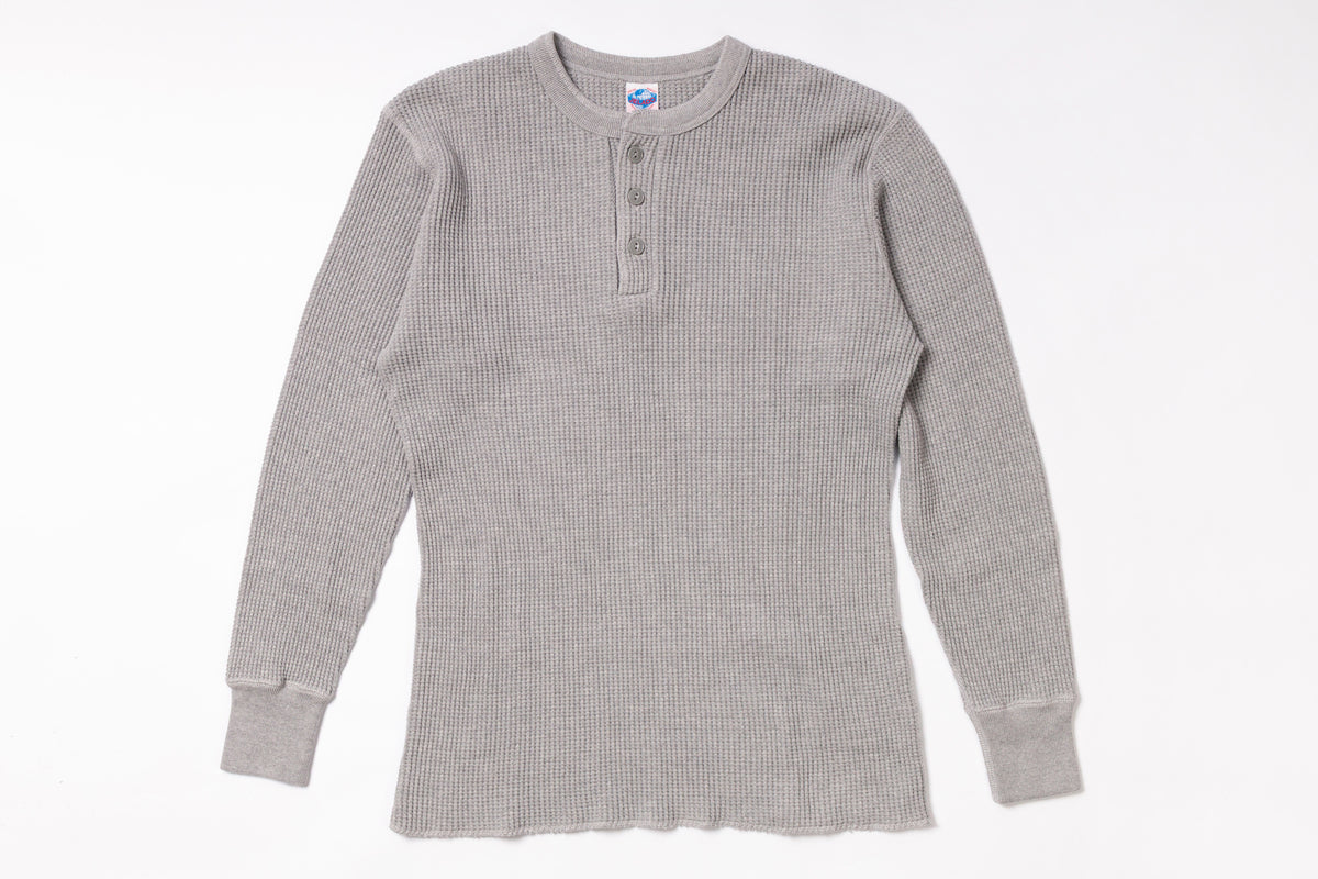 Gray long-sleeve shirt on a white background
