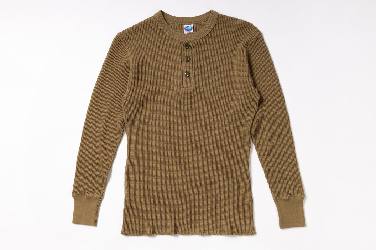 Brown long-sleeve shirt on a white background