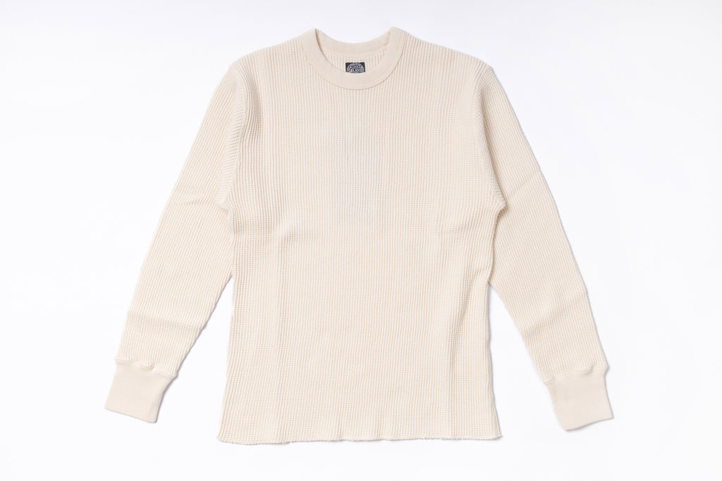 Beige sweater on a white background