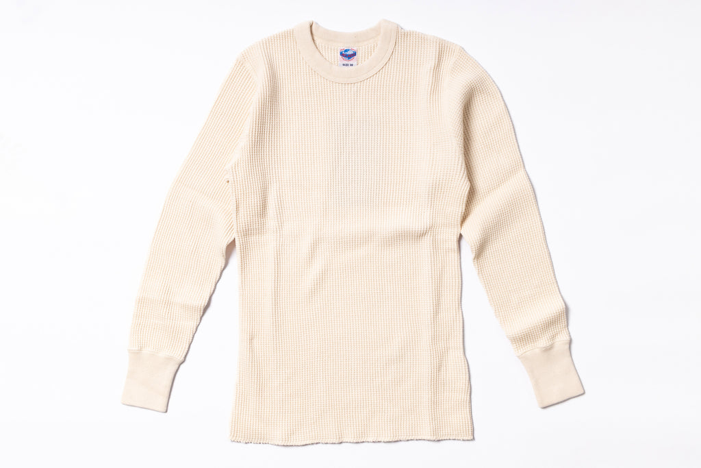 Beige long-sleeve shirt on a white background