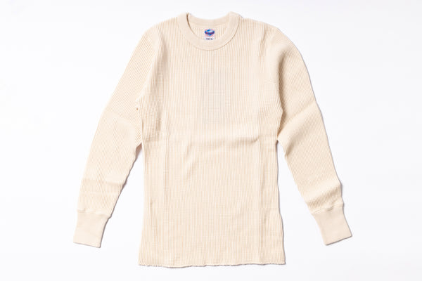 Beige long-sleeve shirt on a white background