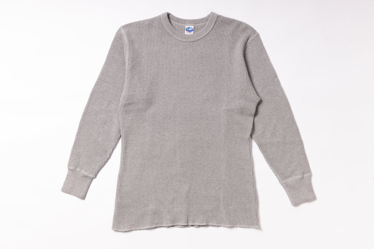 Gray long-sleeve shirt on a white background