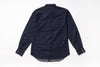 A dark indigo denim long-sleeve shirt shown from the back, laid flat on a white background.
