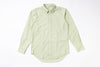 Light green button-up shirt on a white background