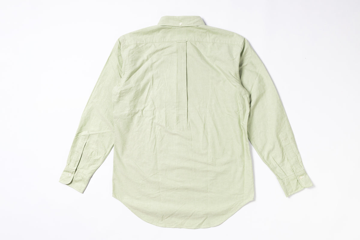 Light green shirt on a white background