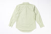 Light green shirt on a white background
