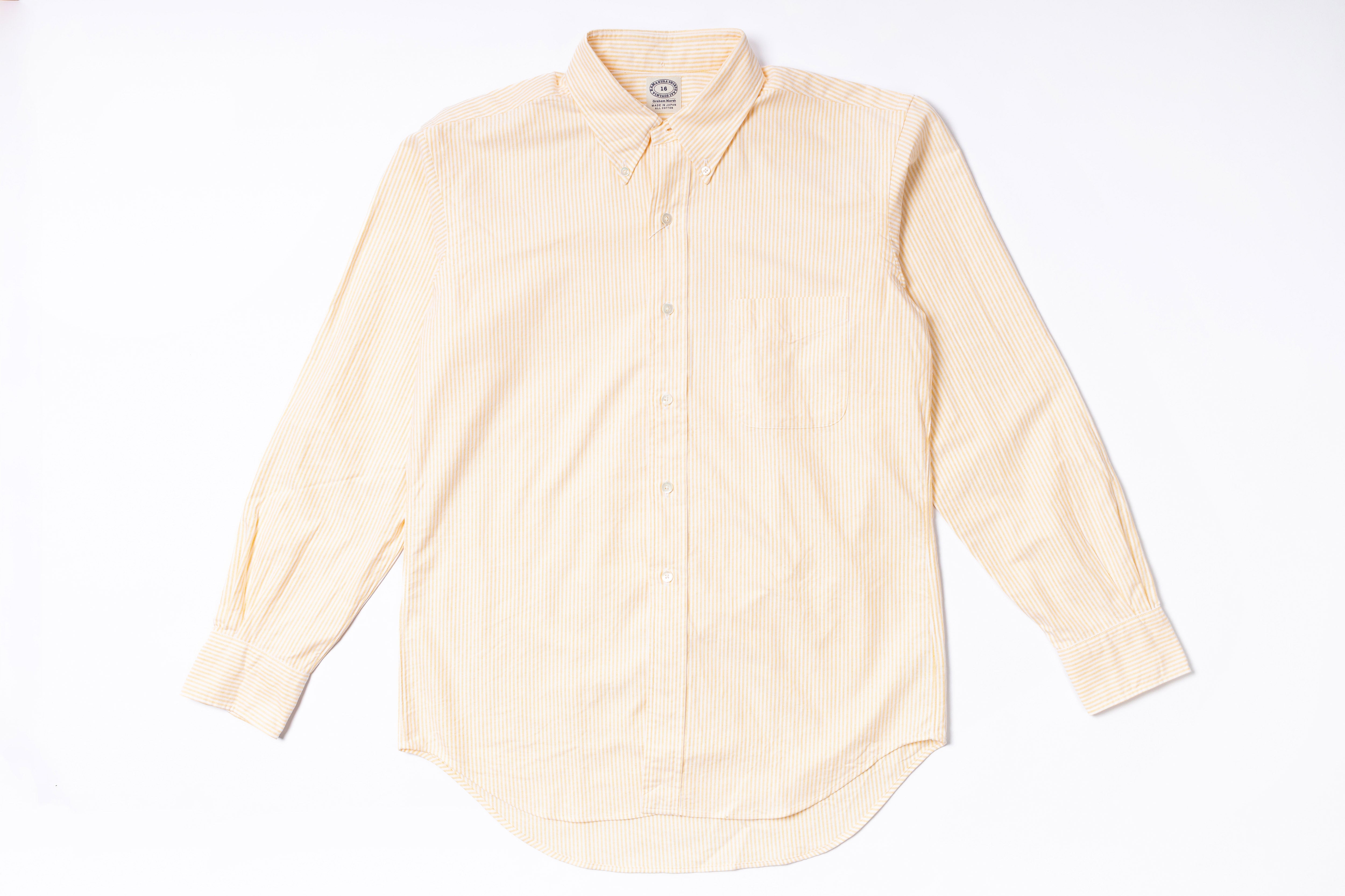 Oxford Shirt with yellow stripes on a white background

