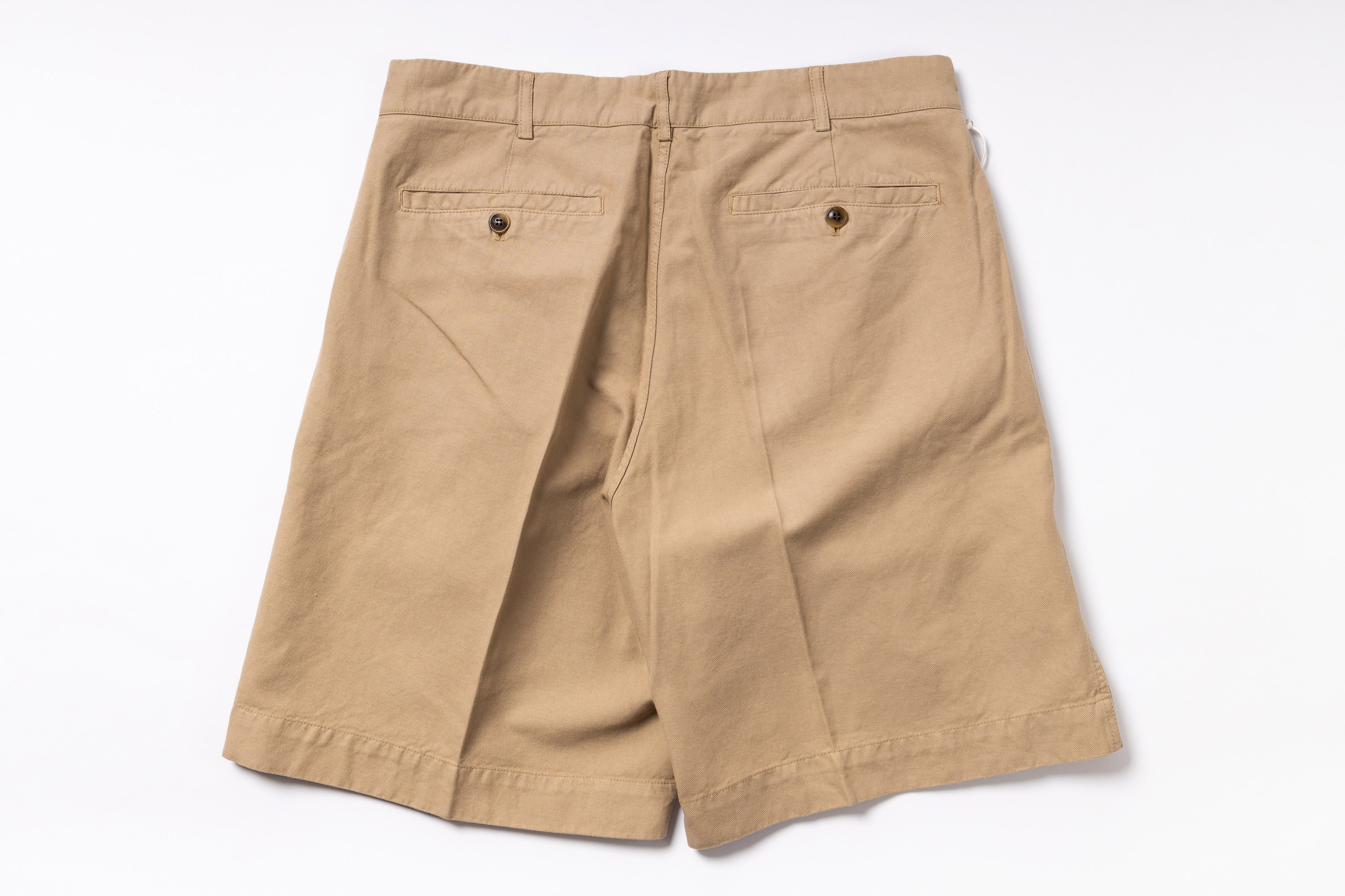 Beige shorts on a white background