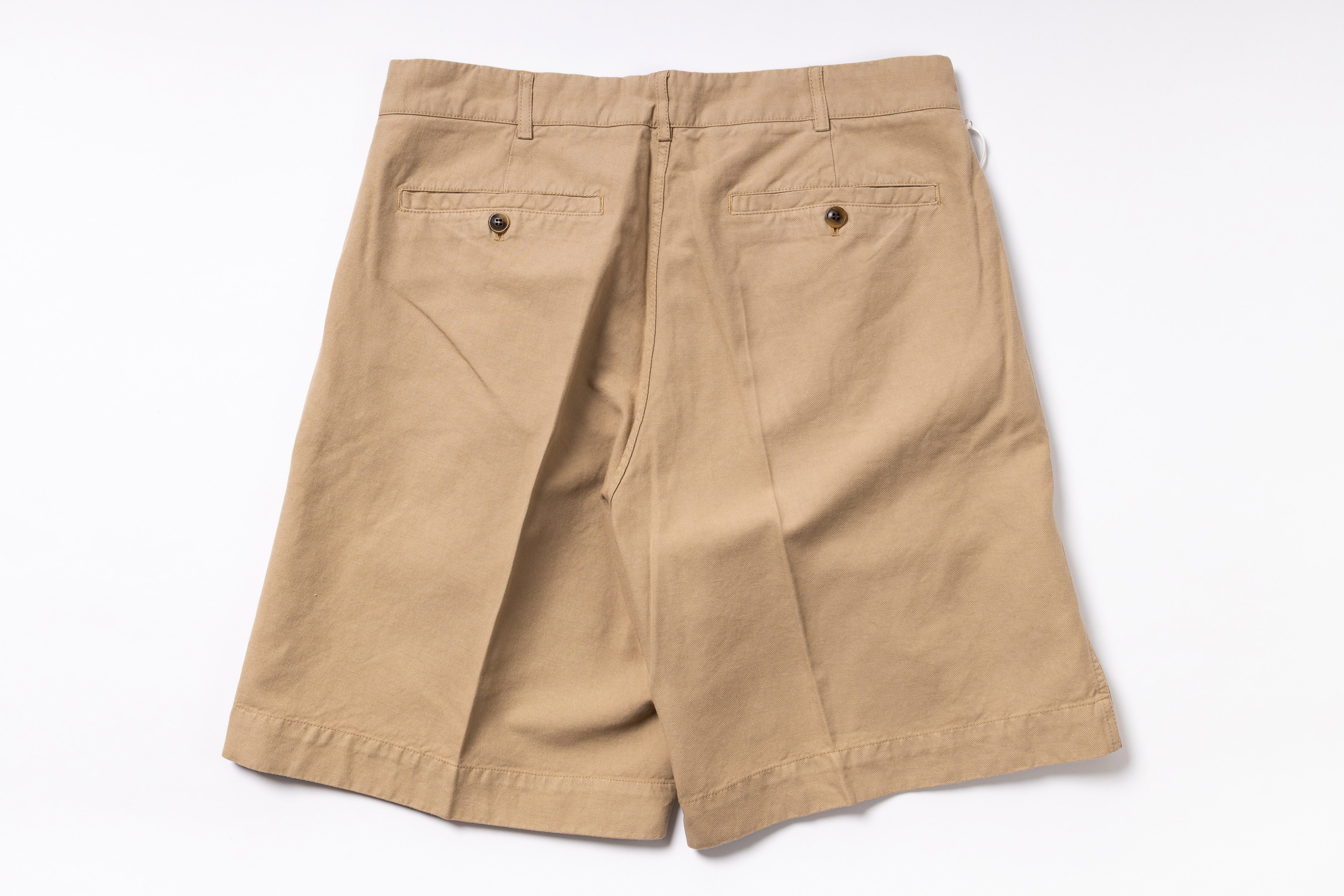 Beige shorts on a white background