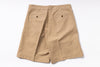Beige shorts on a white background