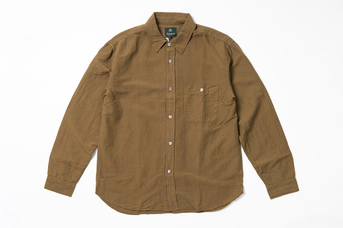 Olive colour shirt on a white background