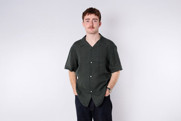 Man wearing a green linen shirt 