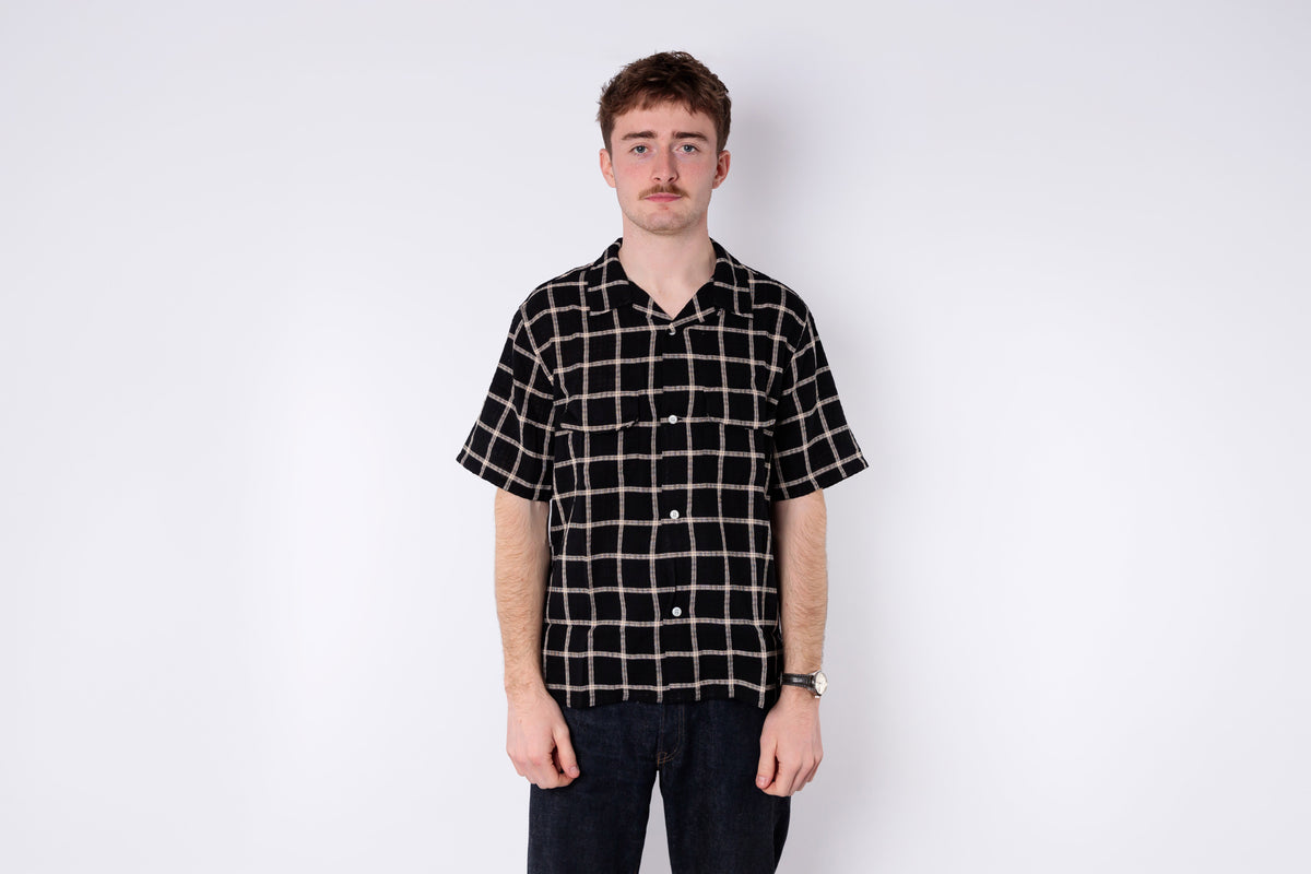 A man wearing a shortsleeve shirt