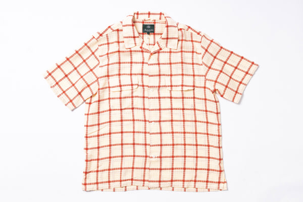 Red and white checkered shirt on a white background