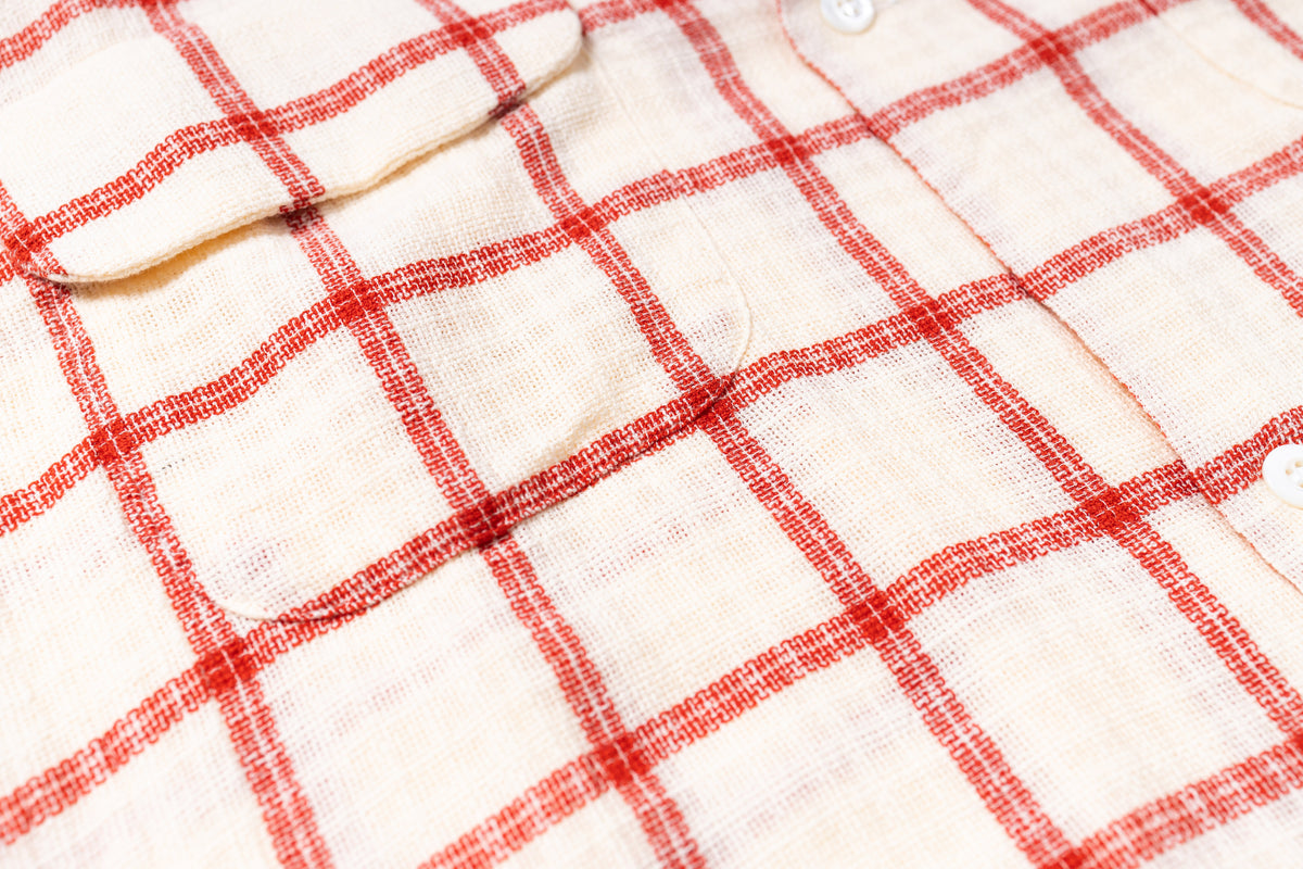 Close-up of a red and white checkered fabric texture