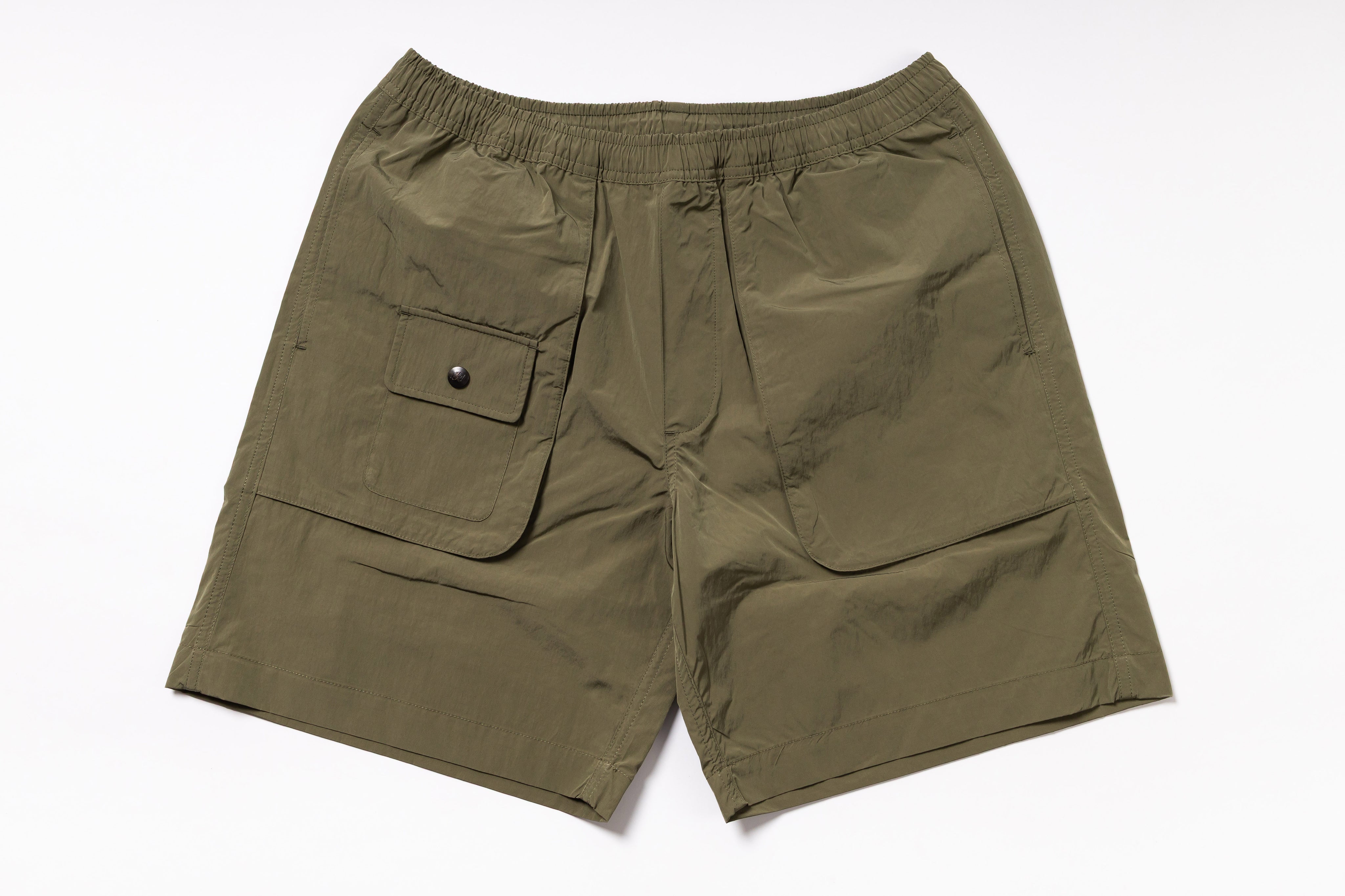 Olive green shorts with a pocket on a white background