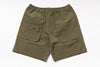 Olive green shorts with a pocket on a white background