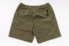Olive green shorts with two front pockets on a white background