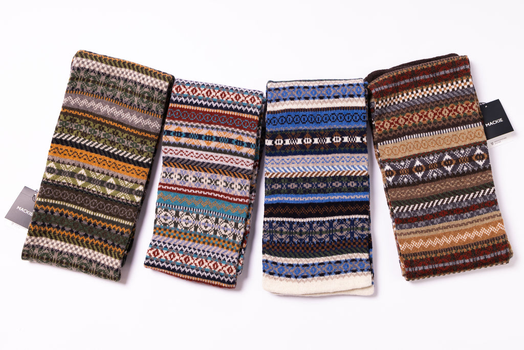 Four patterned fabric swatches on a white background