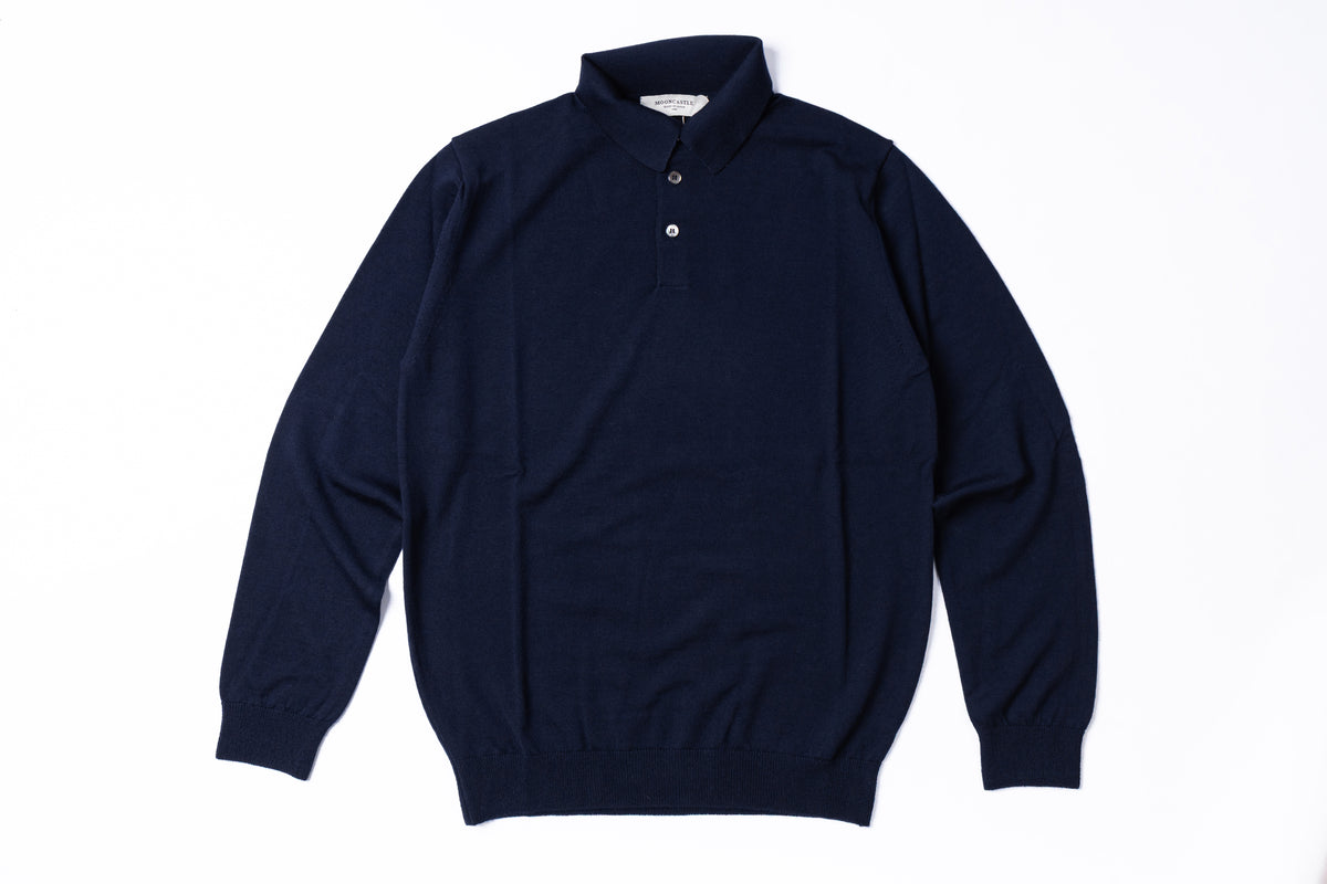 A dark navy blue long-sleeve knit polo sweater with a buttoned collar, laid flat against a clean white background.