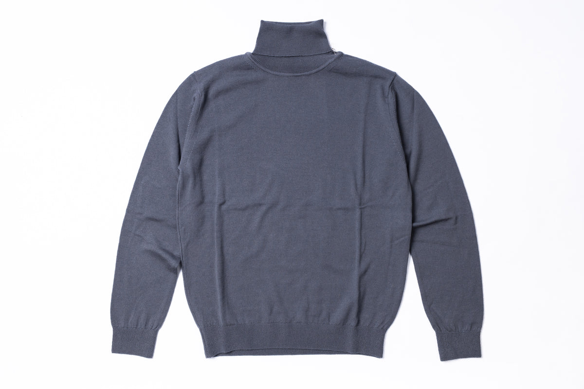 A dark slate gray knit turtleneck sweater shown from the back, laid flat against a clean white background.