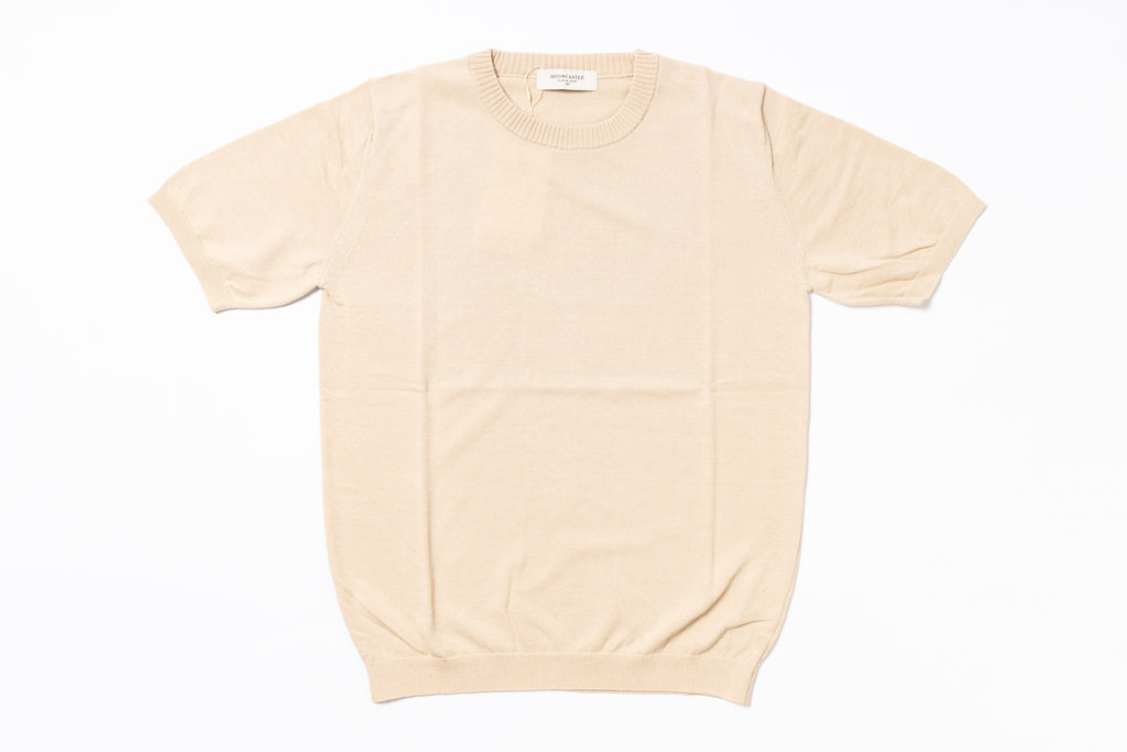 Beige t-shirt on a white background