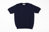 Navy blue t-shirt on a white background