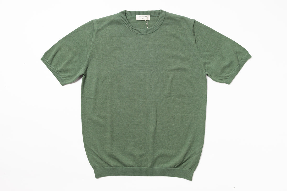 Green t-shirt on a white background