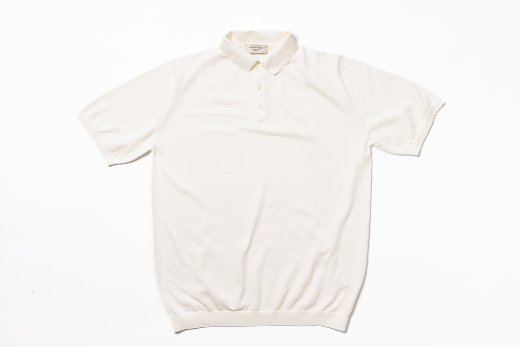 White polo shirt on a white background