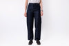 Person wearing dark blue jeans on a white background