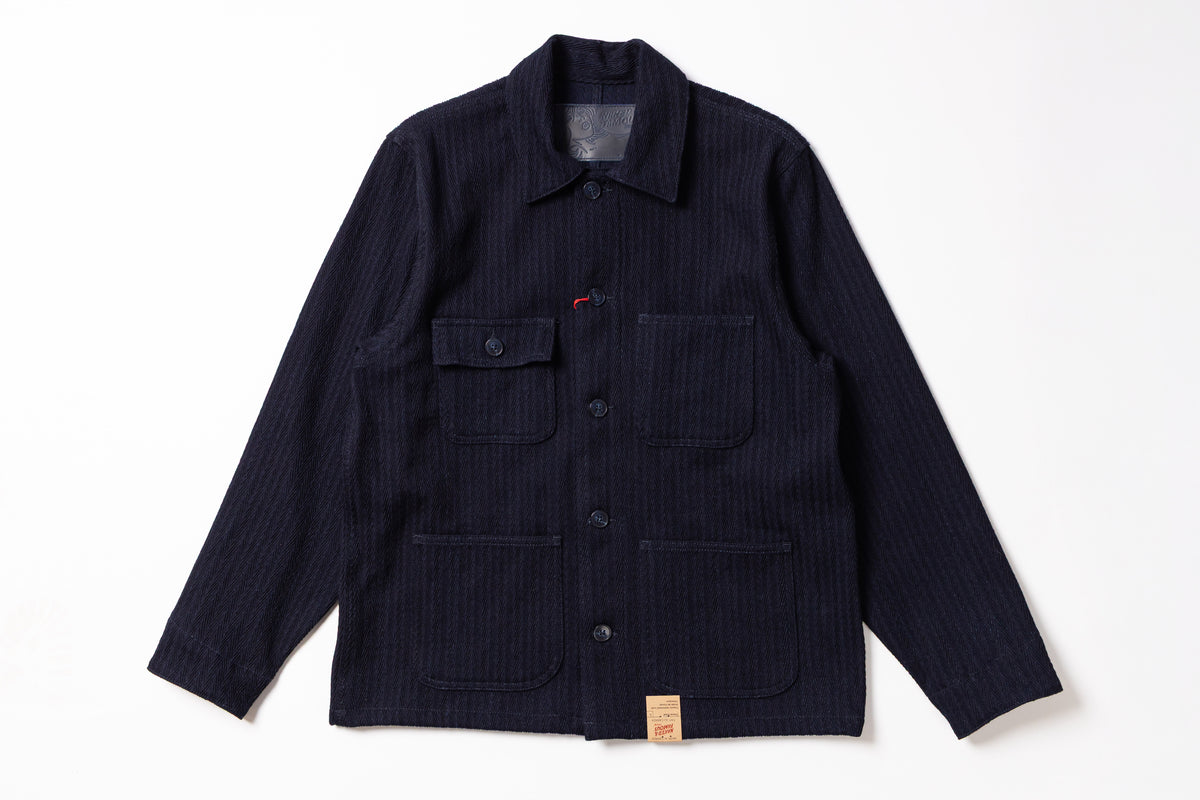 Navy blue jacket with button details on a white background