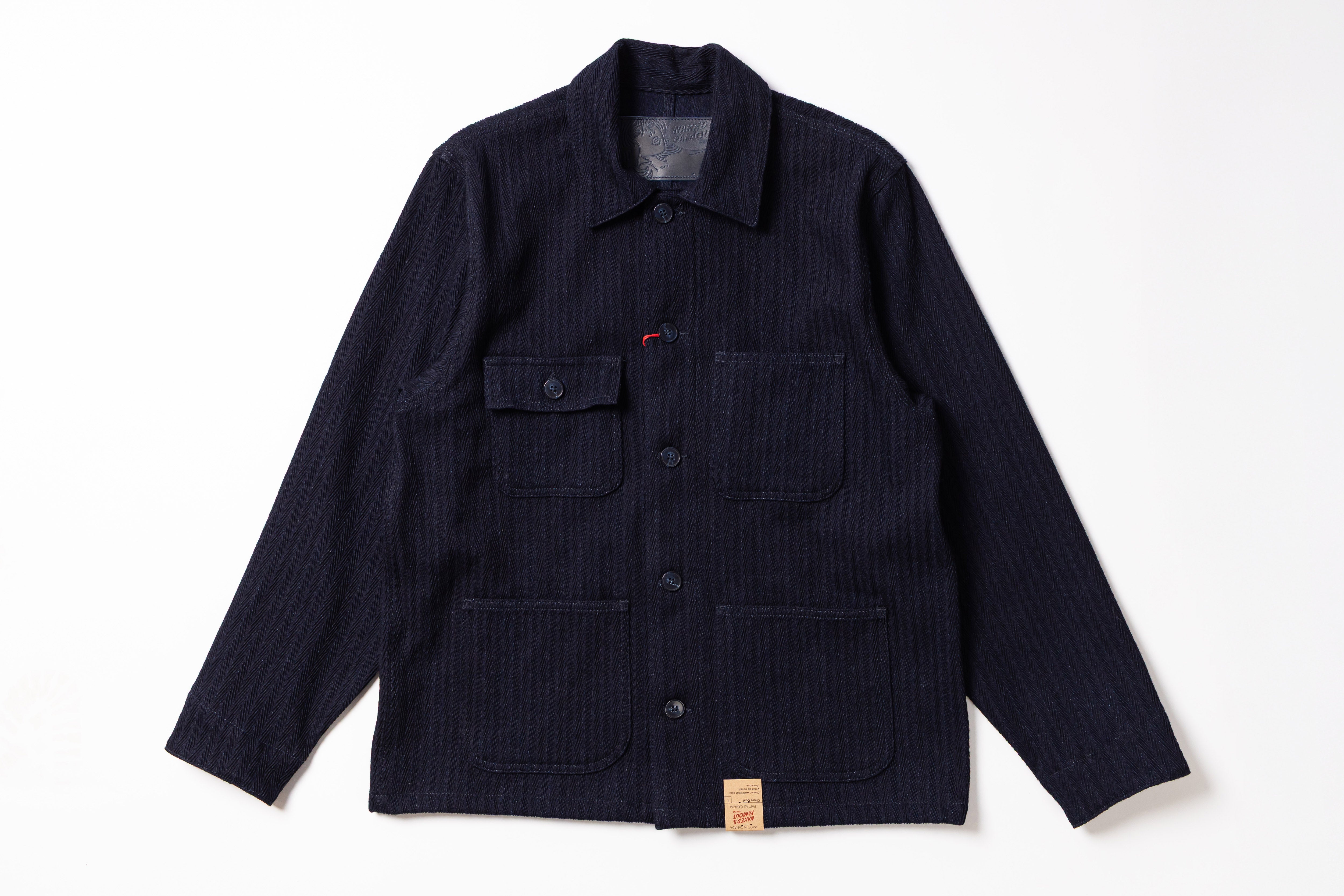 Navy blue jacket with button details on a white background