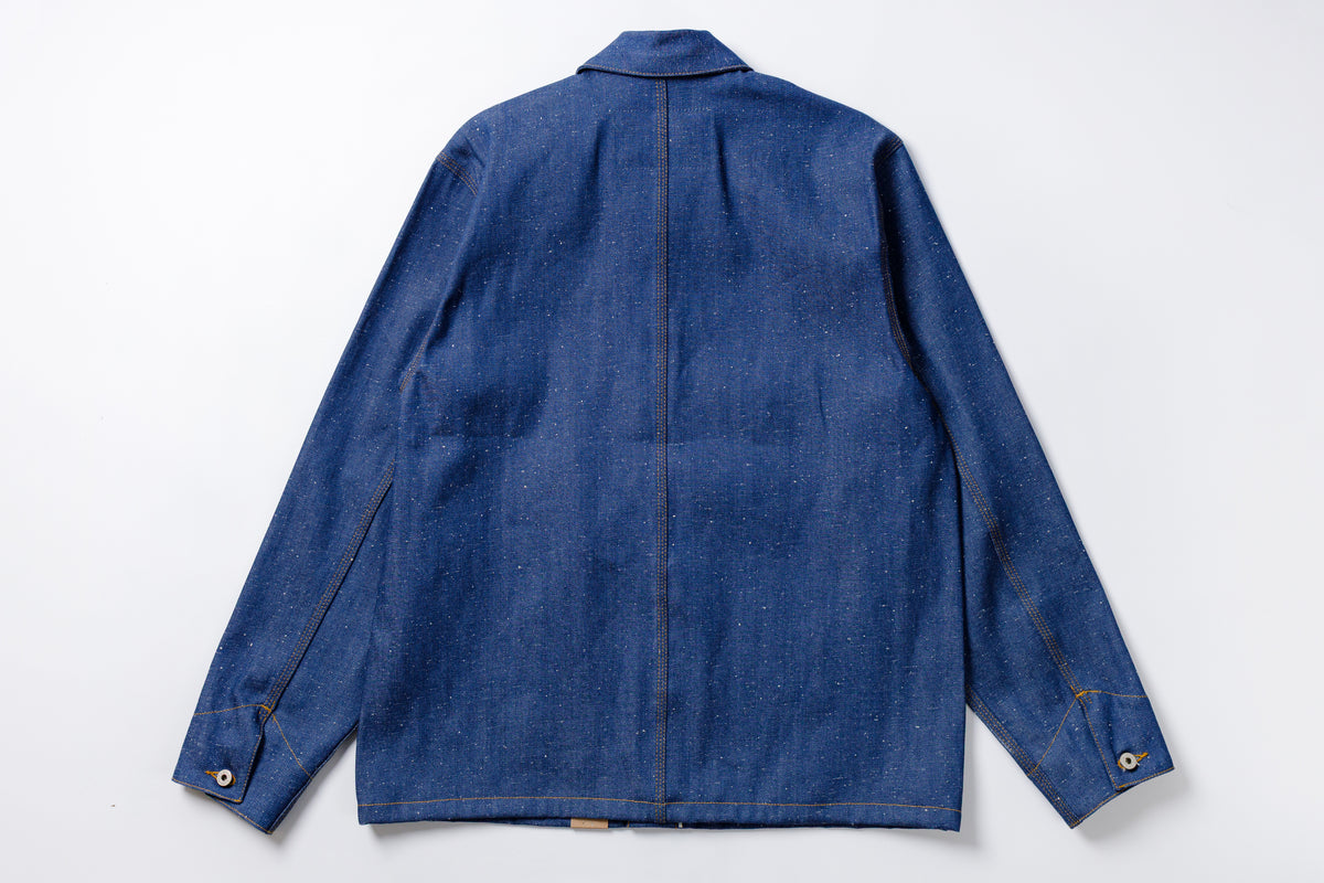 Blue denim jacket on a white background