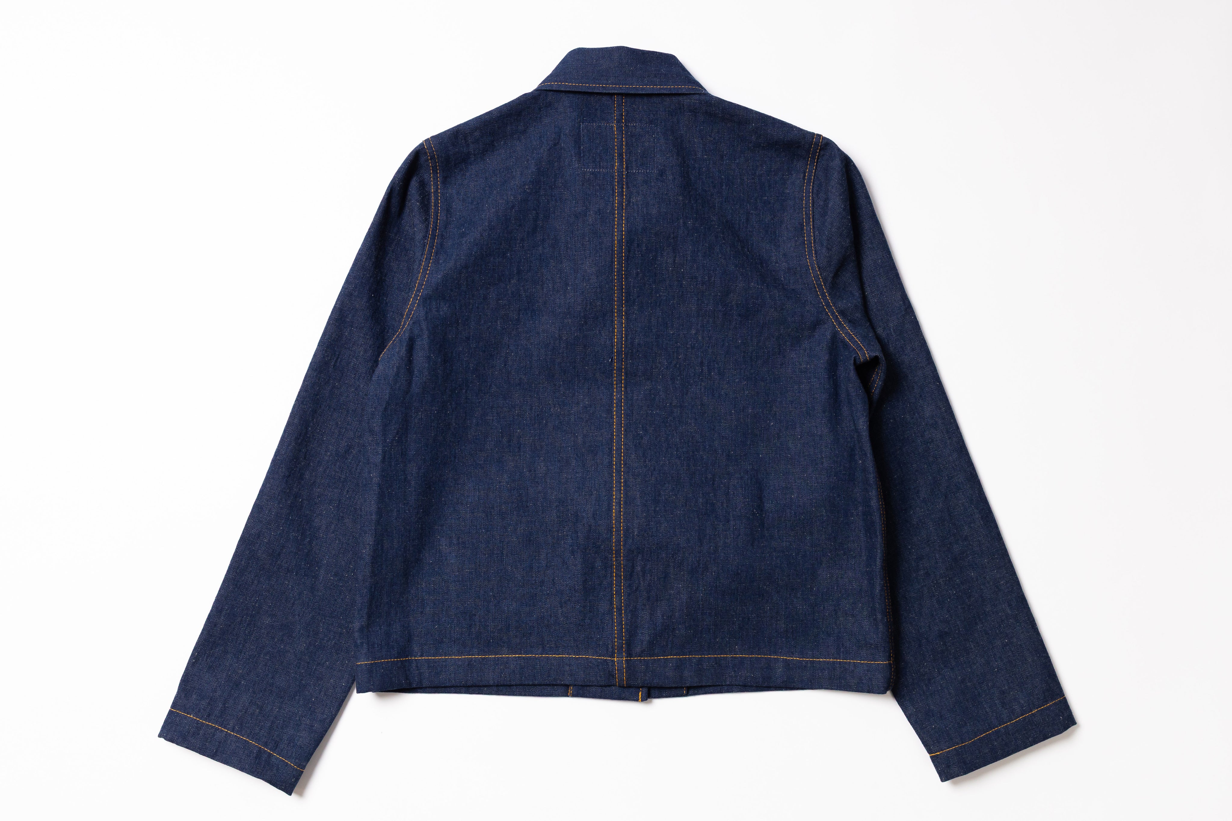Blue denim jacket on a white background
