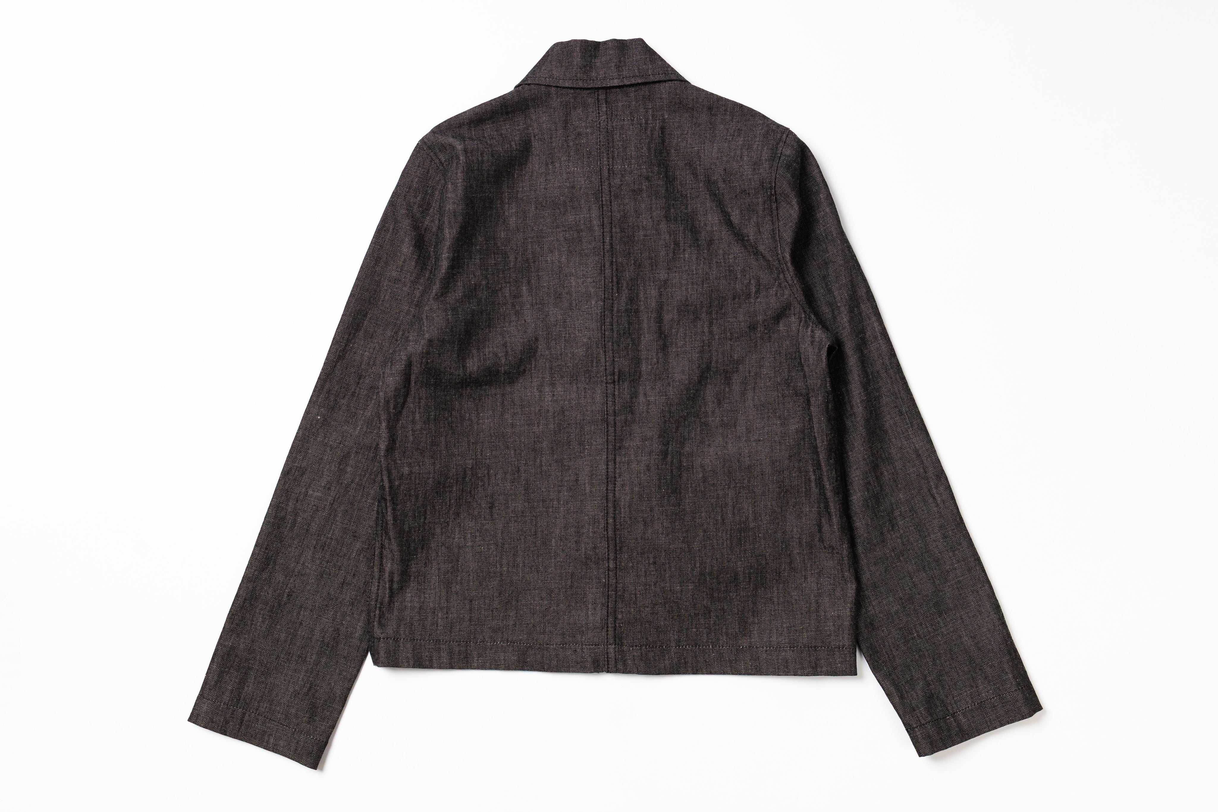 Dark denim jacket on a white background
