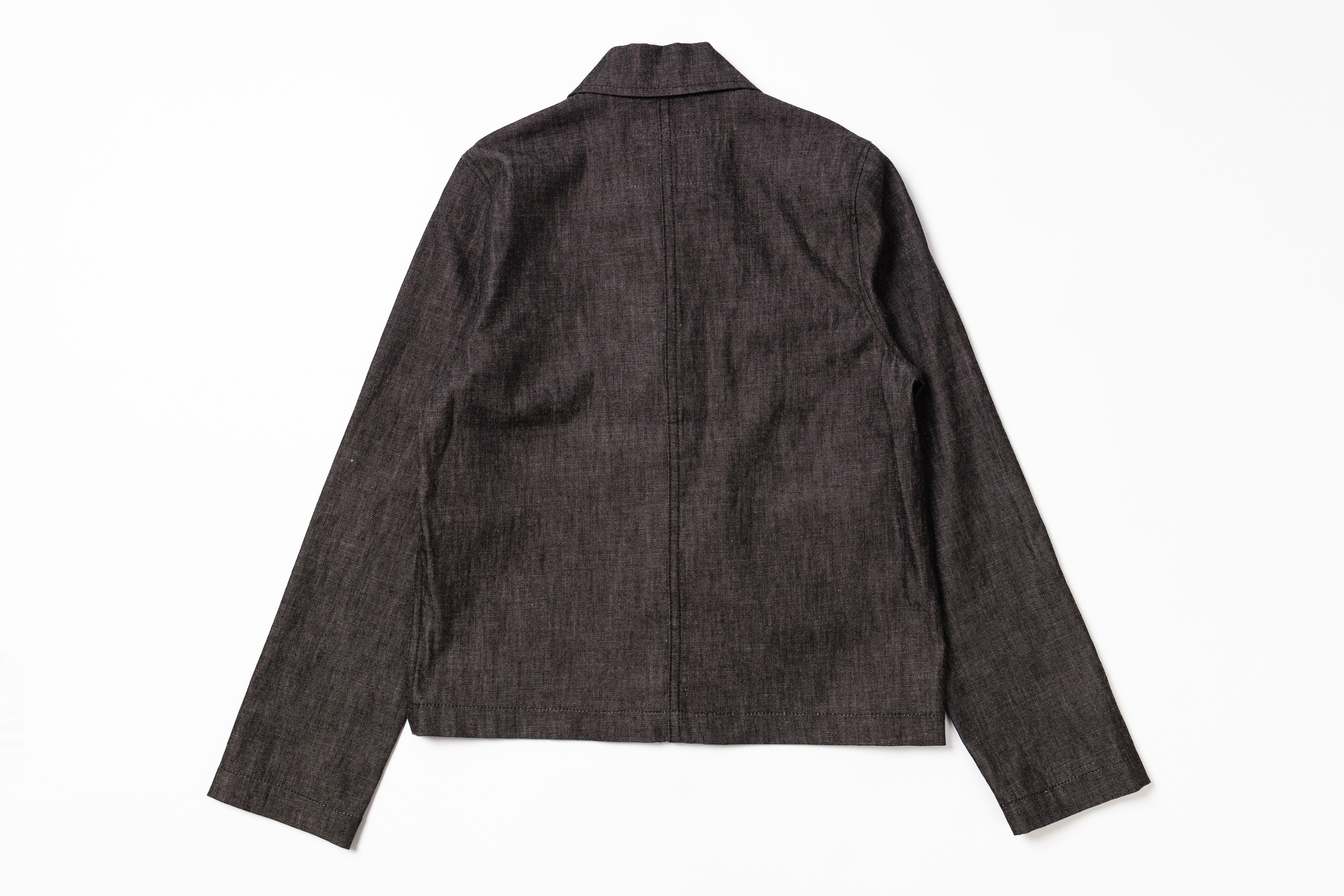 Dark denim jacket on a white background