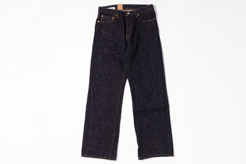 Pair of dark blue jeans on a white background