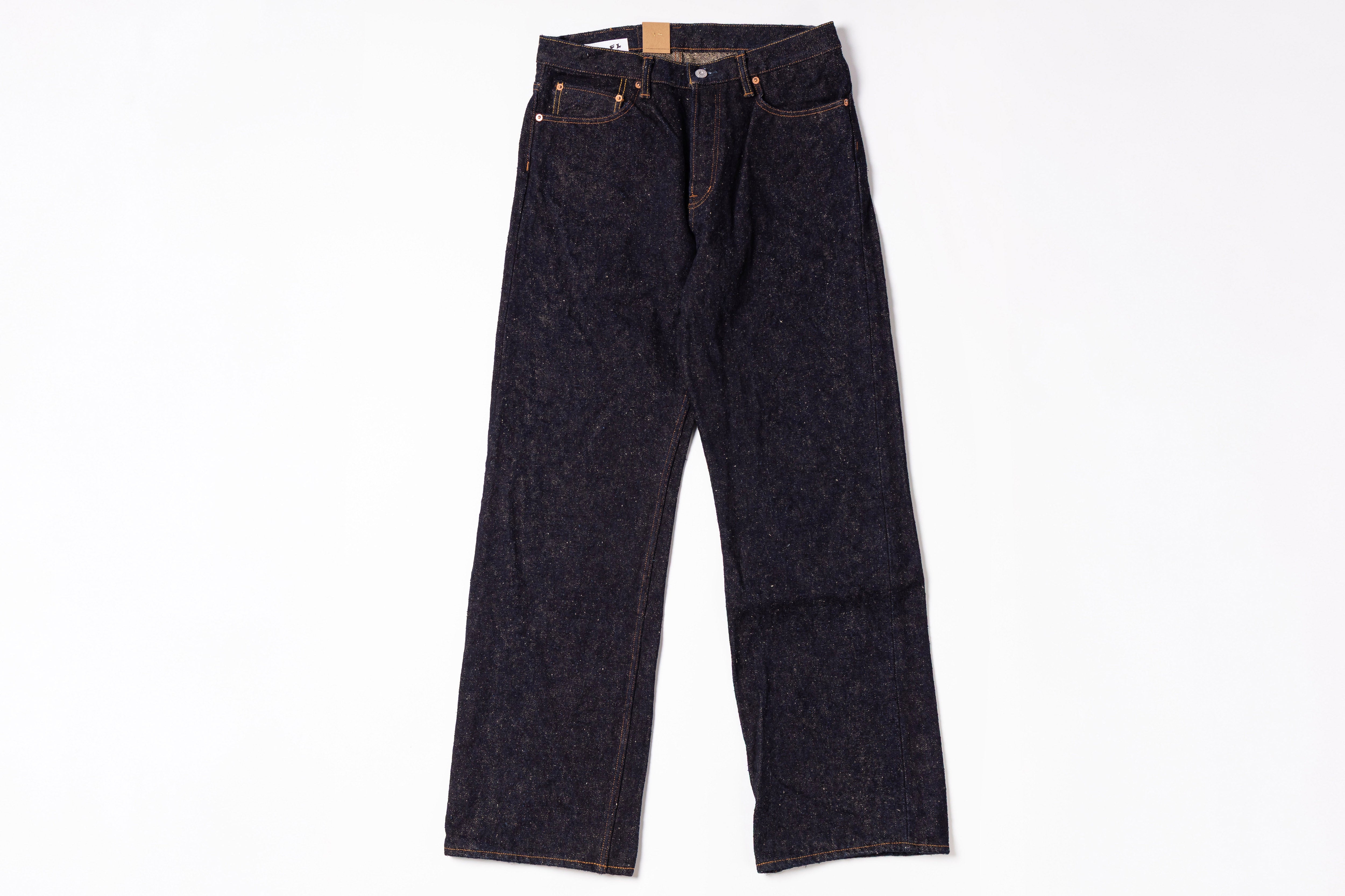 Pair of dark blue jeans on a white background