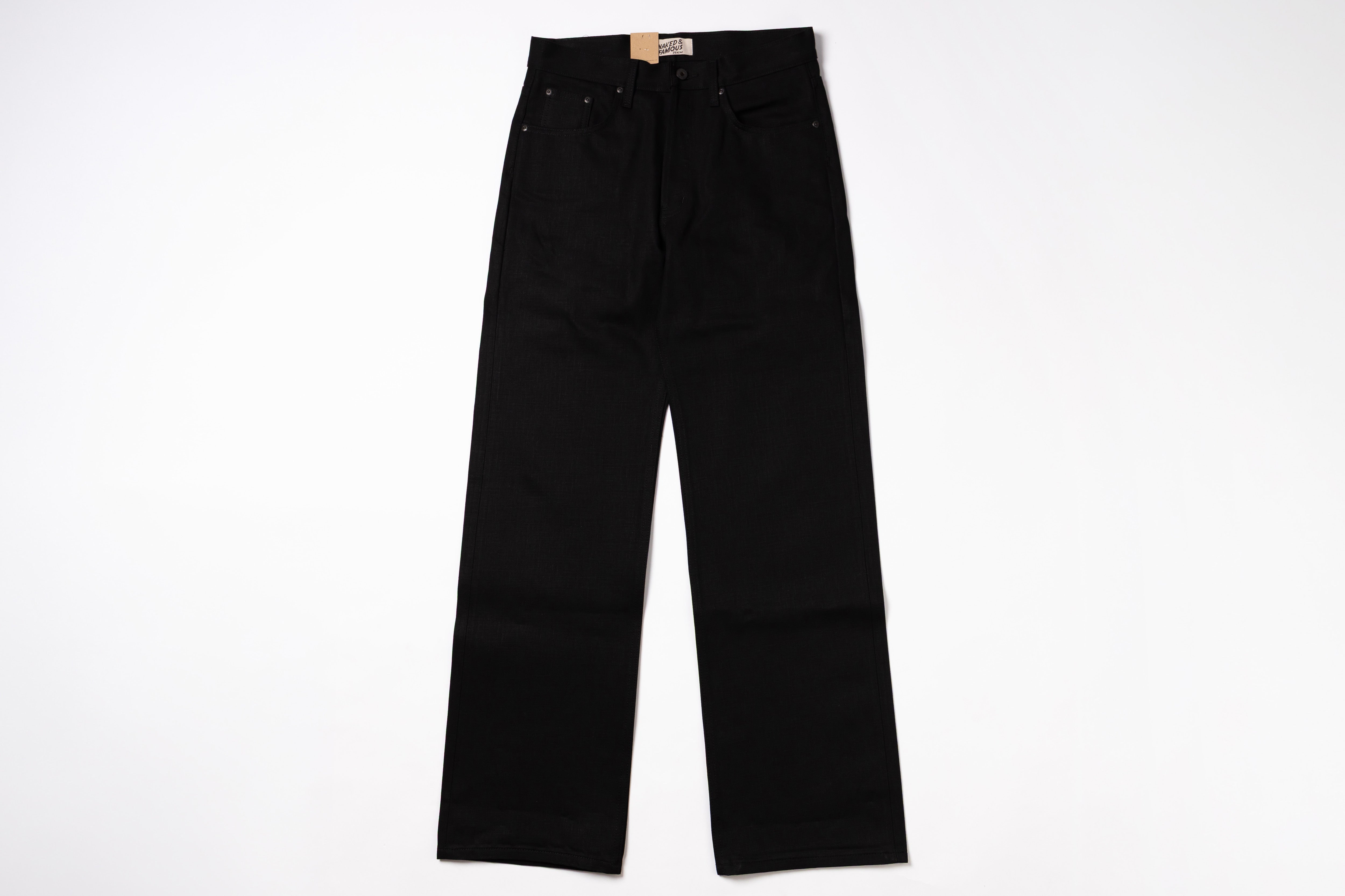 A pair of black wide-leg denim jeans laid flat against a solid white background.