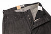 Dark gray pants with a button fly, displayed open to show lining and tags.