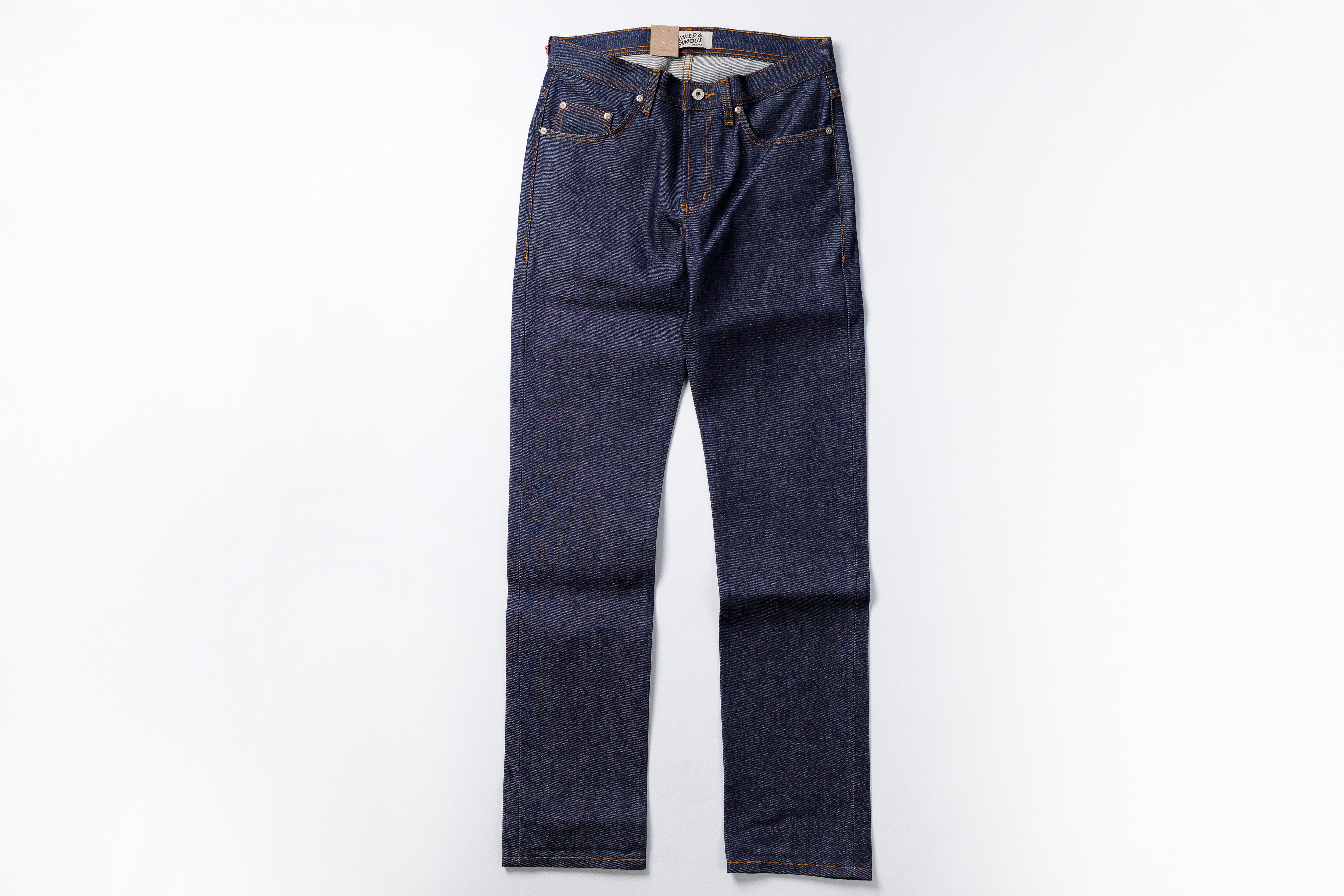 Pair of dark blue jeans on a white background