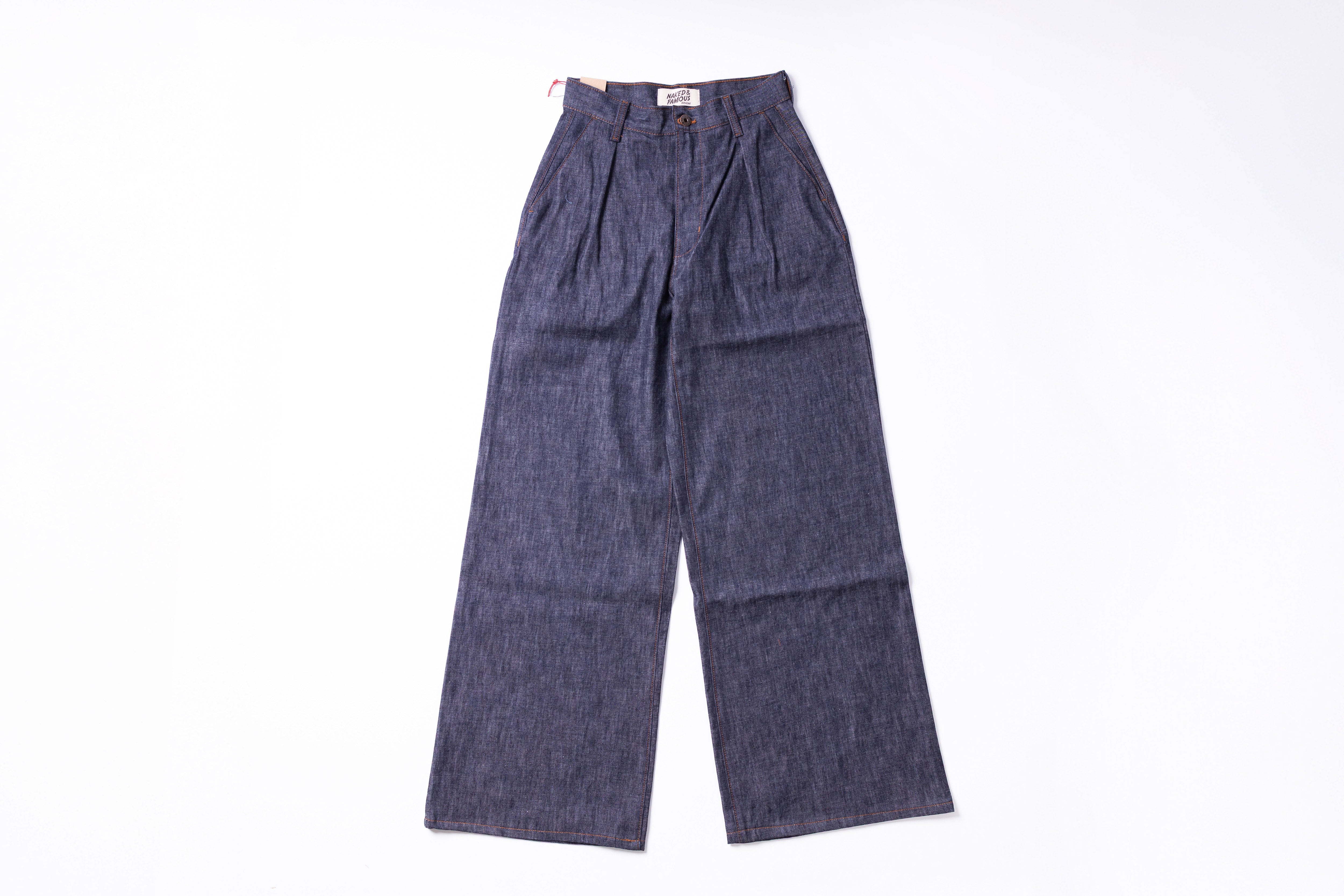 Pair of blue denim pants on a white background