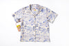 White shirt with blue floral pattern on a white background