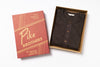 Brown henley shirt in a box with Pike Brothers packaging on a white background